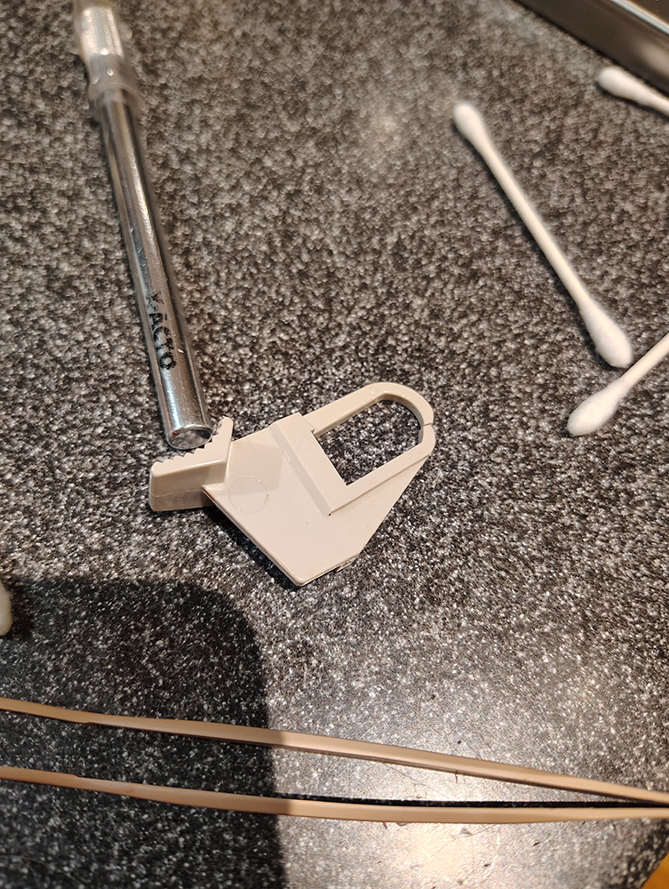 The lever glued back together again.