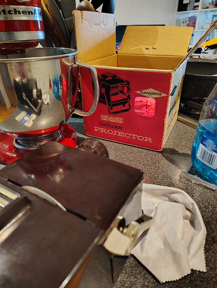 The projector working and displaying a tiny projection of Soo Locks.